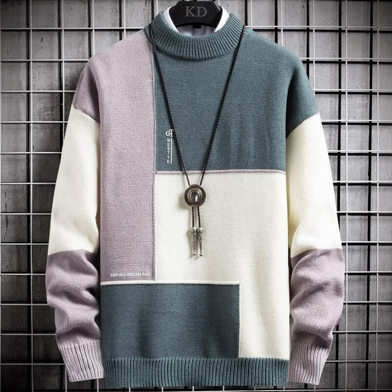 Modieuze slim fit heren patchwork trui. Stijlvolle, comfortabele warme sweater in groen-zwarte kleurenmix.