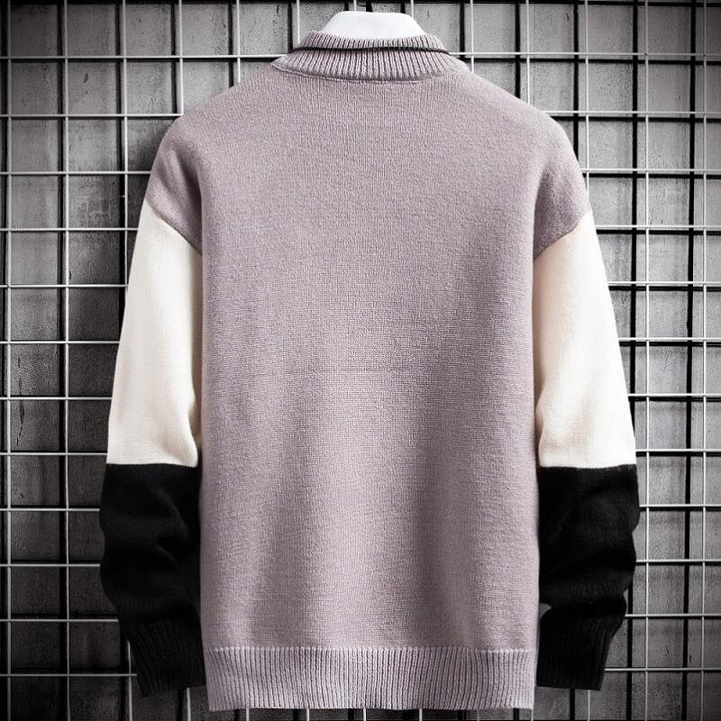 Stijlvolle heren patchwork trui met ronde hals, ideaal voor een casual winterlook. Beschikbaar in groen, zwart, paars.