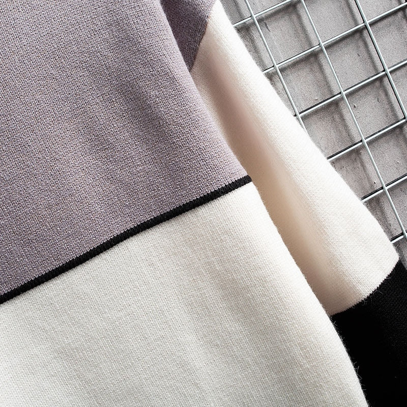 Comfortabele heren patchwork pullover voor de winter. Warme slim fit sweater in groen, zwart en lichtpaars tinten.