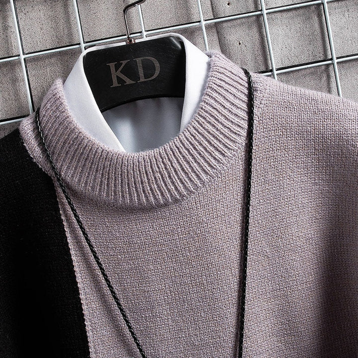 Heren trui met modern patchwork patroon. Deze warme, zachte sweater in groen, zwart, lichtpaars is slim fit.