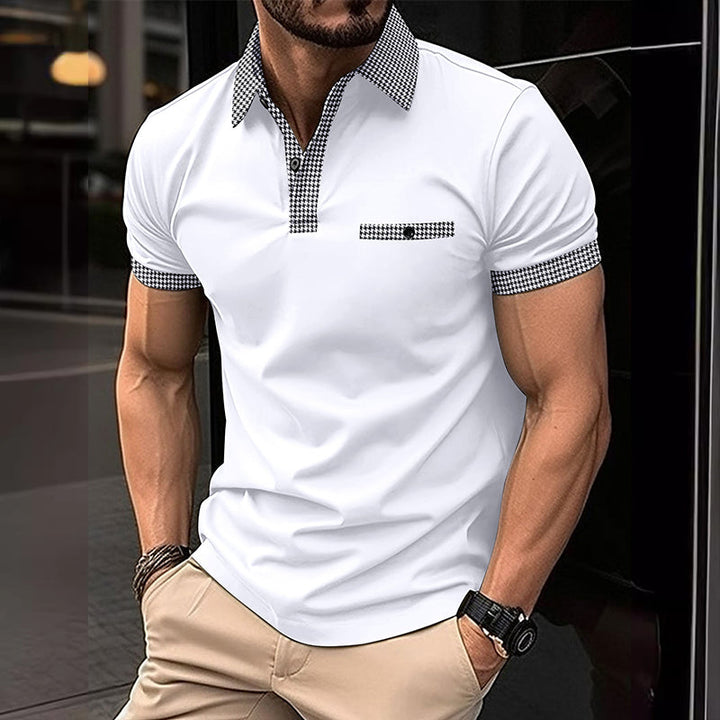 Heren polo shirt met korte mouwen, voorzien van een trendy pied-de-poule patroon en moderne pasvorm.