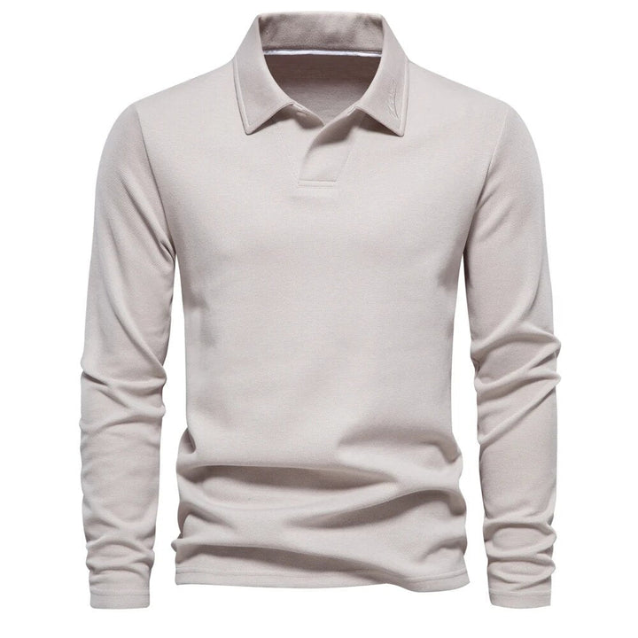 Stijlvolle heren polotrui met lange mouwen in zachte stof. Perfect voor een moderne, comfortabele outfit.