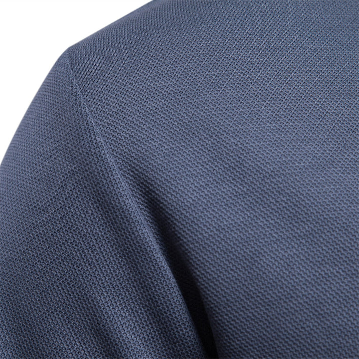 Veelzijdige heren polotrui met lange mouwen, perfect voor overgangsseizoenen. Comfortabele en warme trui.