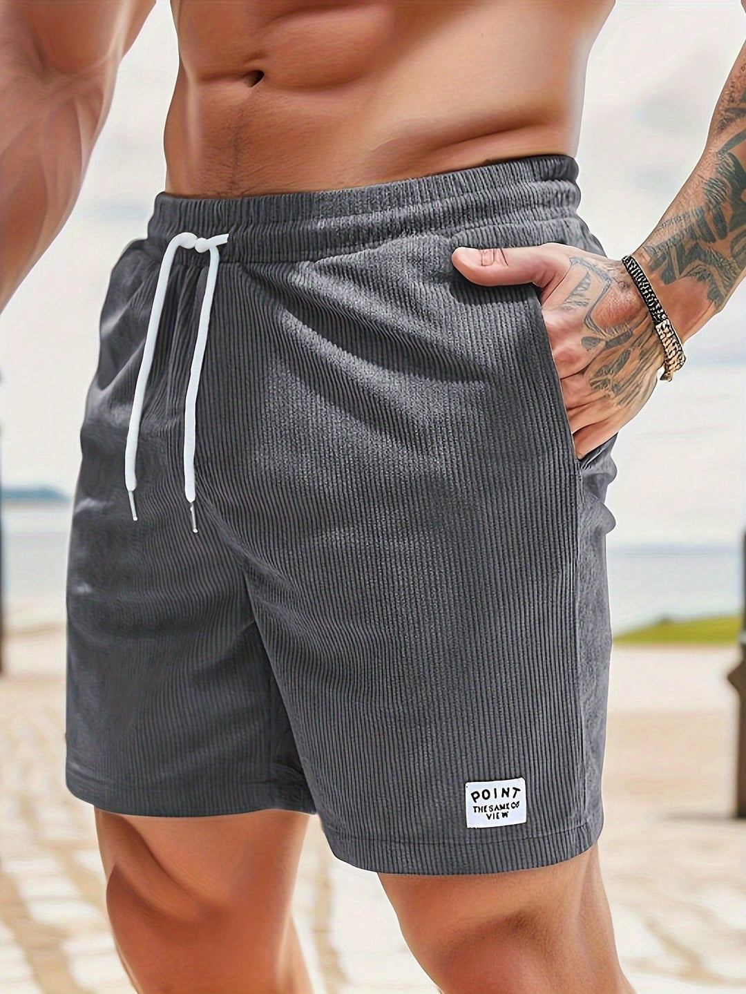 Heren strand shorts, relaxed fit, met elastische taille en koordjes, essentieel voor je zomervakantie.