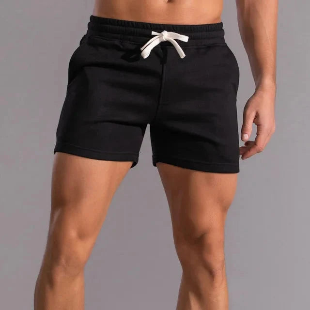 Detail van de elastische taille en het verstelbare trekkoord van deze veelzijdige casual herenshorts.