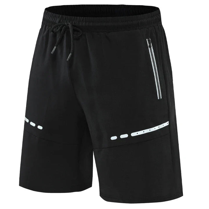 Comfortabele heren hardloopshorts en fitness kleding; slim-fit model met ritszakken voor actieve dagen.