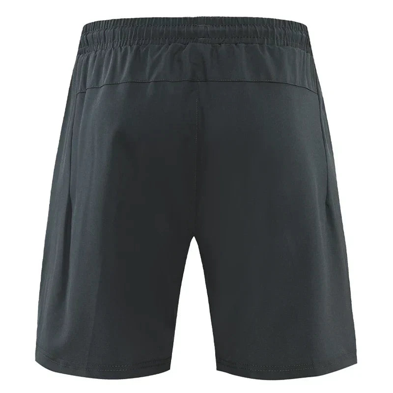 Lichte en ademende heren zomershorts; slim-fit design met ritszakken, ideaal voor vrijetijd en sport.