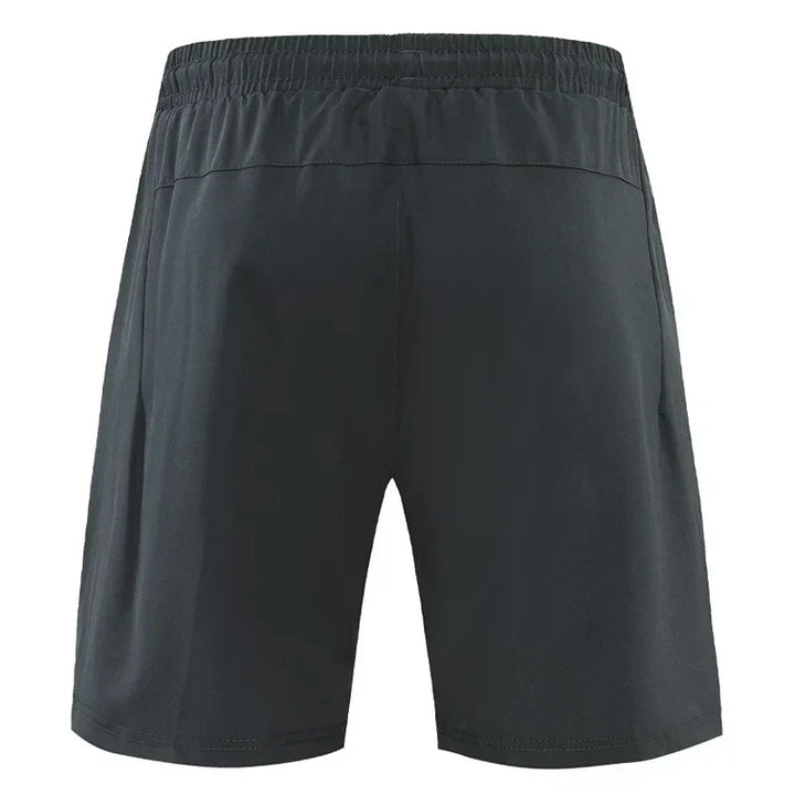 Lichte en ademende heren zomershorts; slim-fit design met ritszakken, ideaal voor vrijetijd en sport.