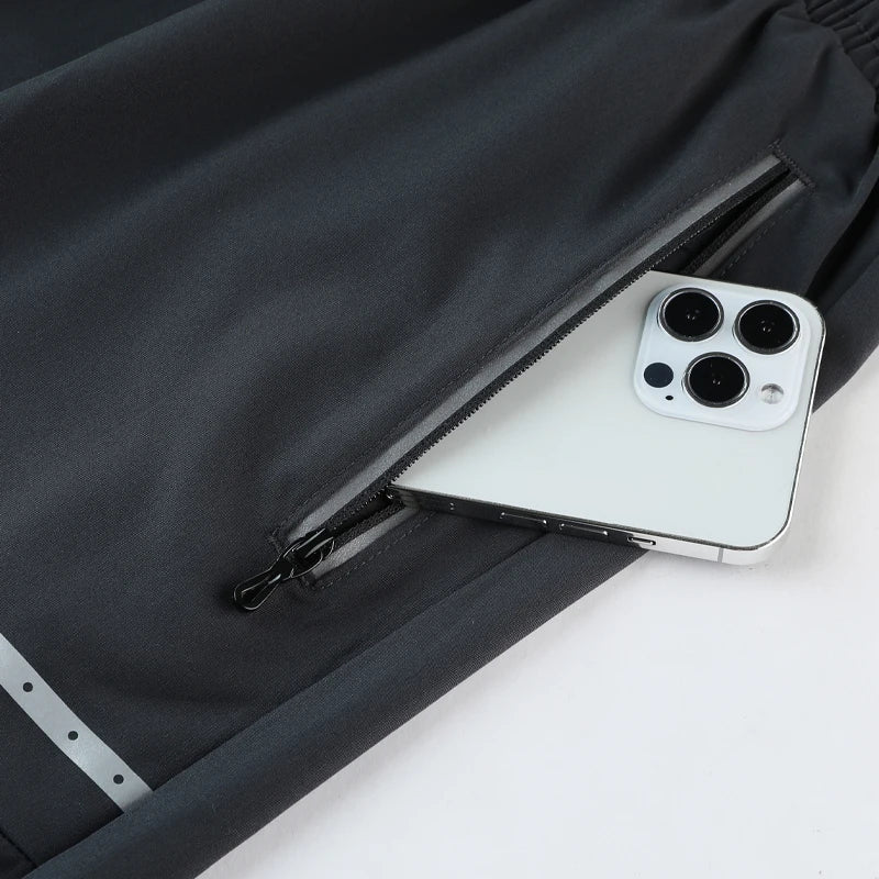 Performance heren trainingsshorts slim-fit met ritszakken; comfortabele sportkleding voor elke workout.