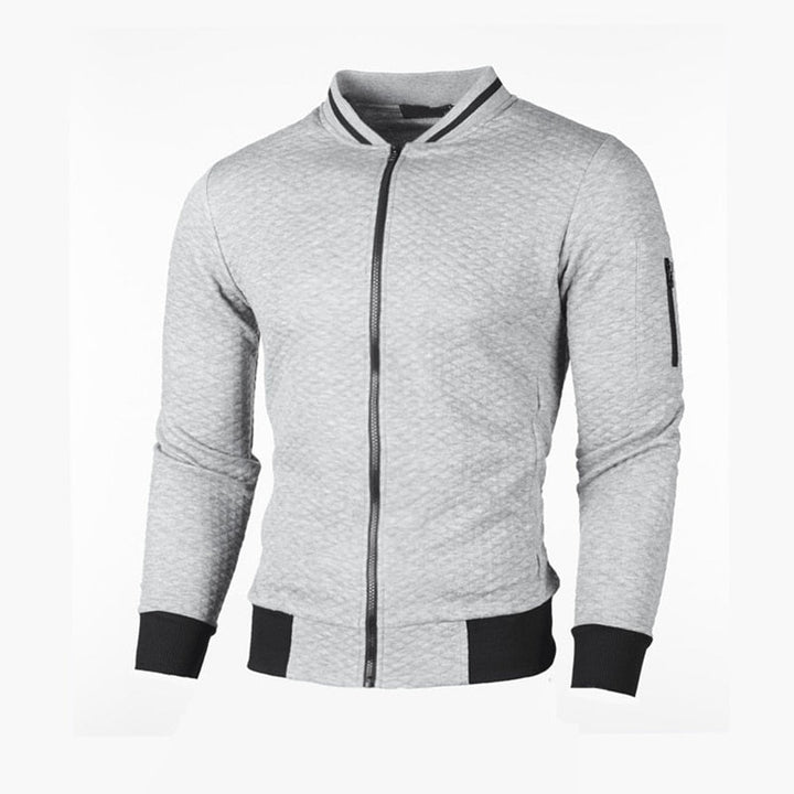 Zwart herenvest, slim fit, met subtiel ruitpatroon; perfect voor sportieve, modieuze look.