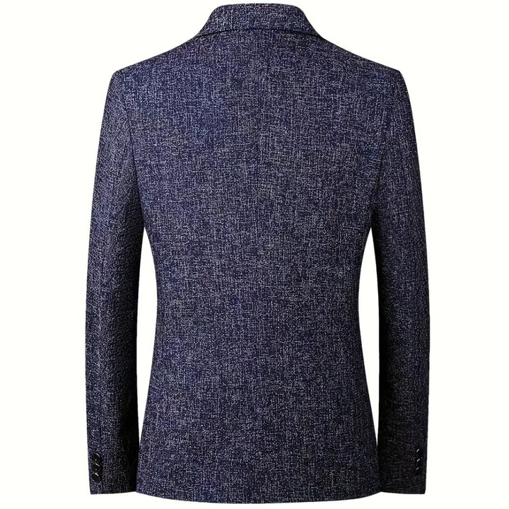 Stijlvolle heren blazer met moderne pasvorm, essentieel voor een complete modieuze herengarderobe.