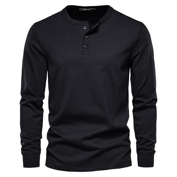 Stijlvol heren Henley T-shirt met lange mouwen. Ademend & veelzijdig voor casual lente looks.