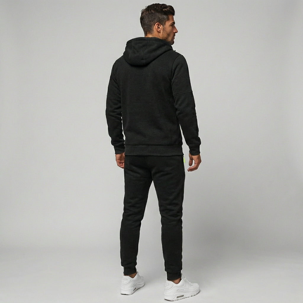 Comfortabel heren tweedelig joggingpak, perfect voor sportieve activiteiten en casual dagelijkse mode.