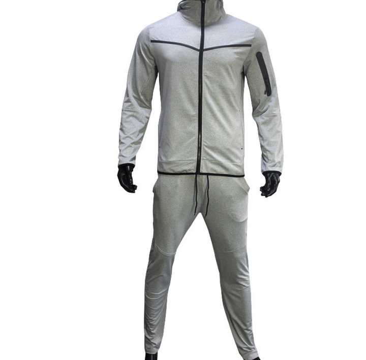 Atletisch Taavi heren trainingspak, ideaal als sportkleding. Winddicht en waterbestendig voor buiten.