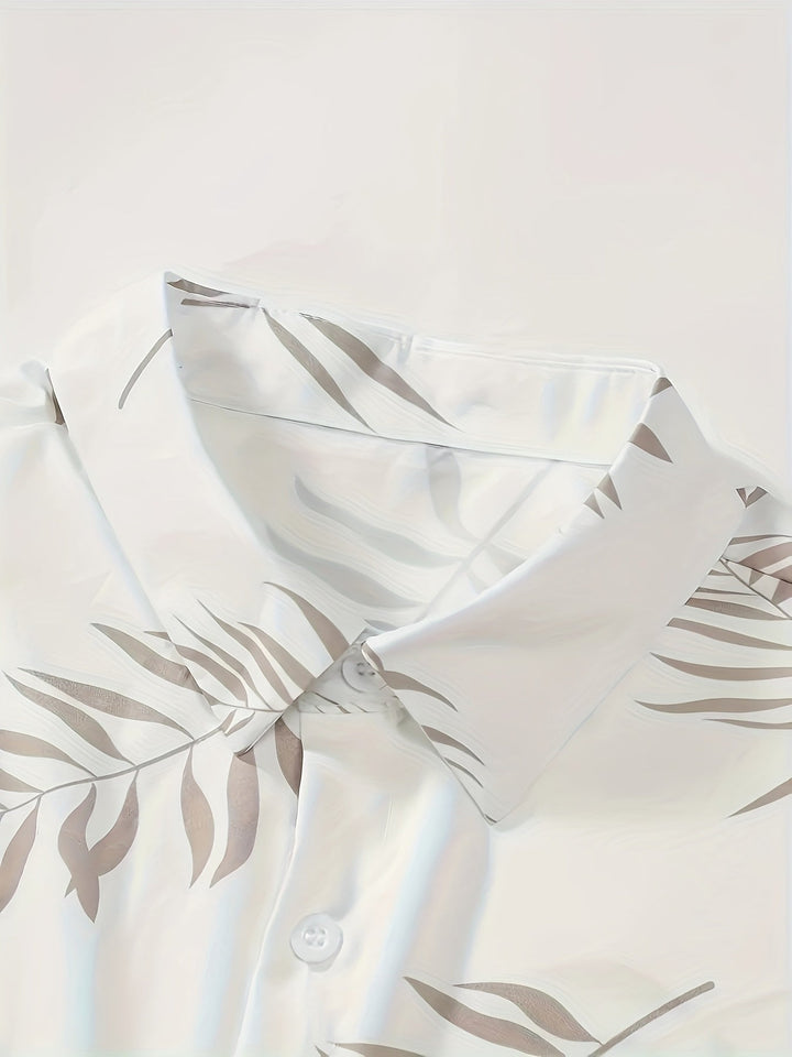 Stijlvolle heren tweedelige set met unieke bladprint, perfect voor zomerse uitjes, strand of casual mode.