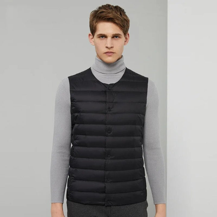 Lichtgewicht Laurent donsbodywarmer voor heren, een stijlvol en warm mouwloos jack voor buiten.