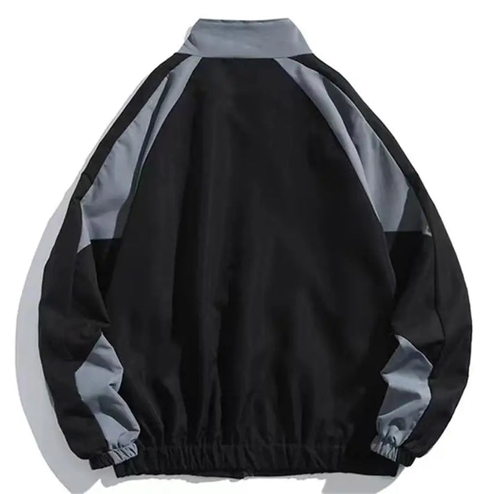 Stijlvolle Aria windbreaker voor heren, modern color-block design, perfect als casual lentejas.