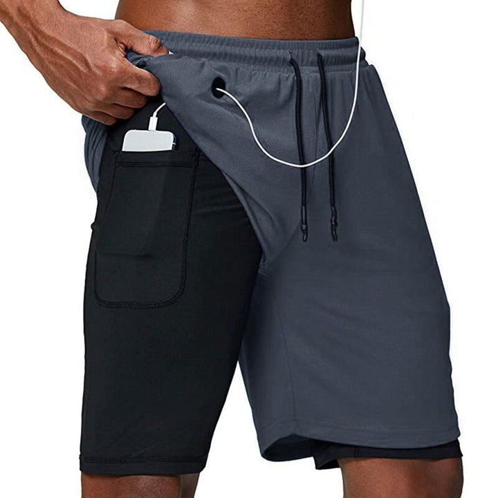 Praktische hardloopbroek heren met shirtdrager en X-Fit compressie fit.