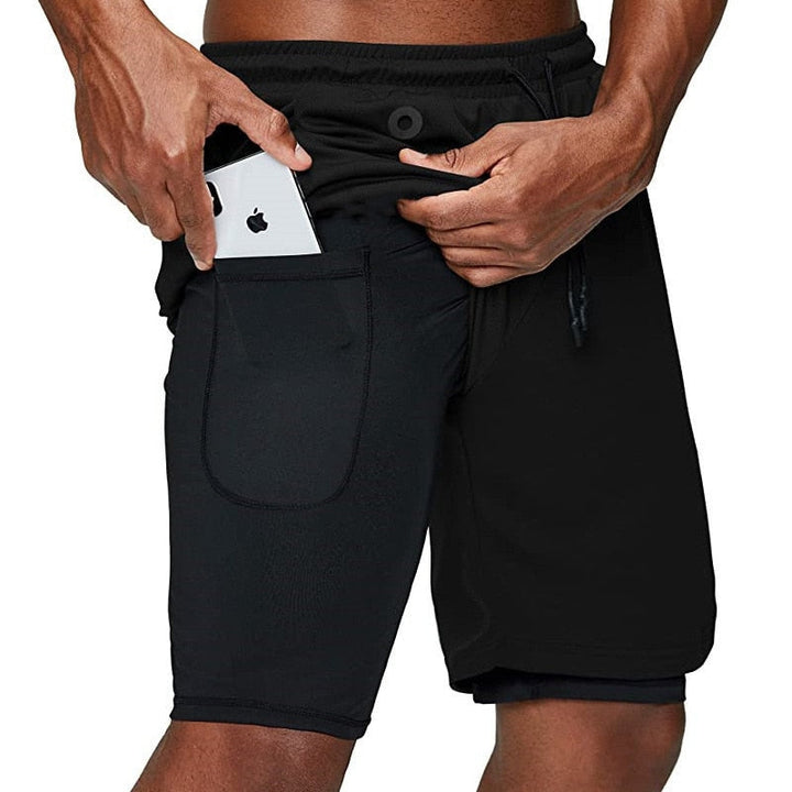 Heren hardloopbroek met strategisch geplaatste telefoonzak, X-Fit collectie.