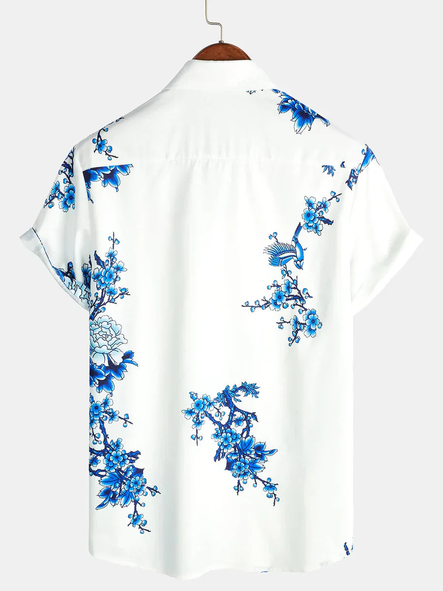 Modieus heren overhemd met bloemenprint en korte mouwen. Comfortabel voor warme zomerdagen en vakantie.