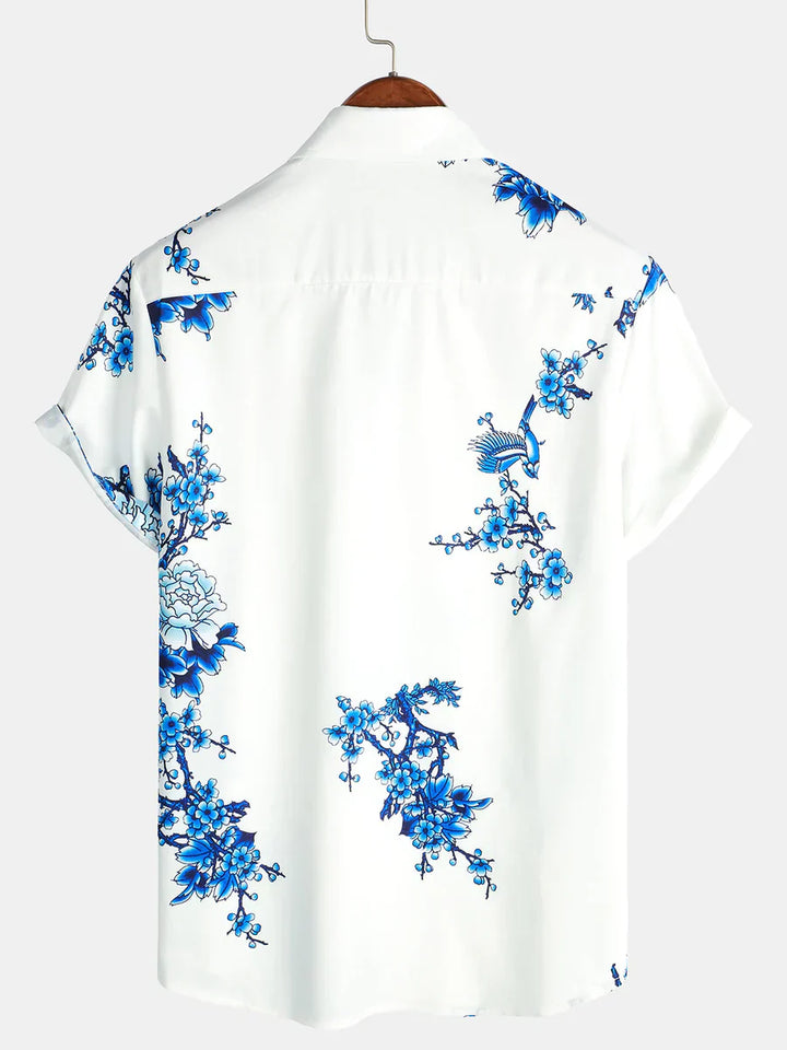 Modieus heren overhemd met bloemenprint en korte mouwen. Comfortabel voor warme zomerdagen en vakantie.