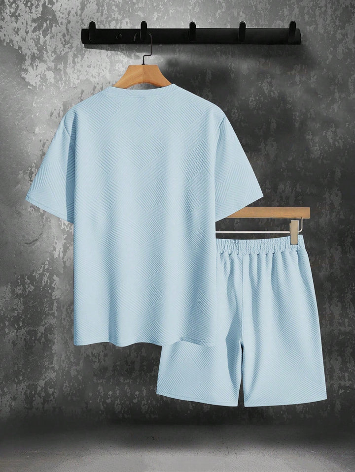 Casual heren set met kortemouw T-shirt en ademende sportshorts, ideaal als trainingspak voor warme dagen.