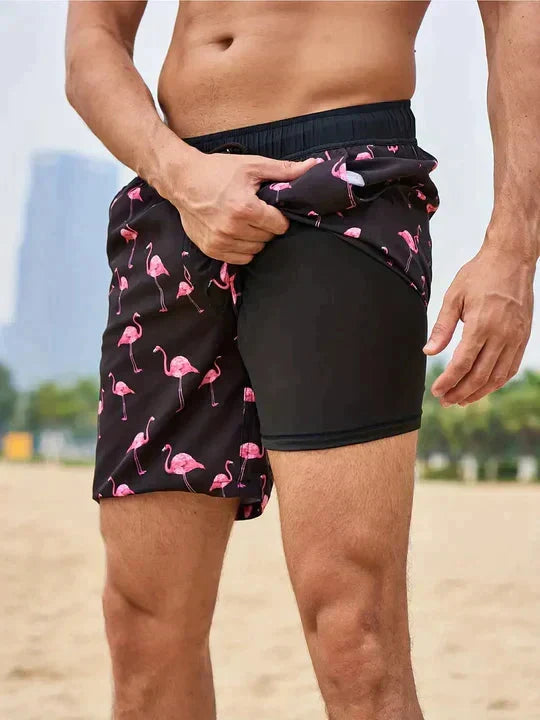 Stijlvolle herenzwembroek met flamingo print en zwarte binnenbroek