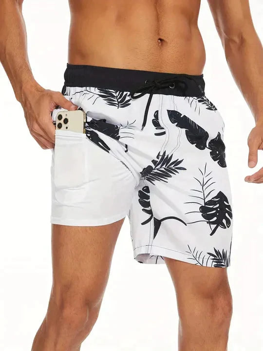 Heren zwembroek met tropische print en comfortabele binnenbroek voor de zomer.