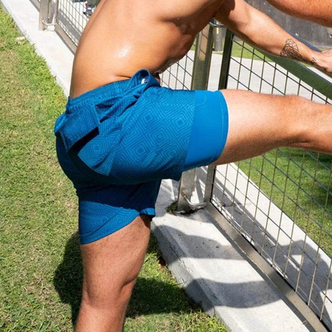 Sneldrogende heren zwemshorts Maurizio met ondersteunende compressiebroek. Ideaal voor actieve mannen en stranddagen.