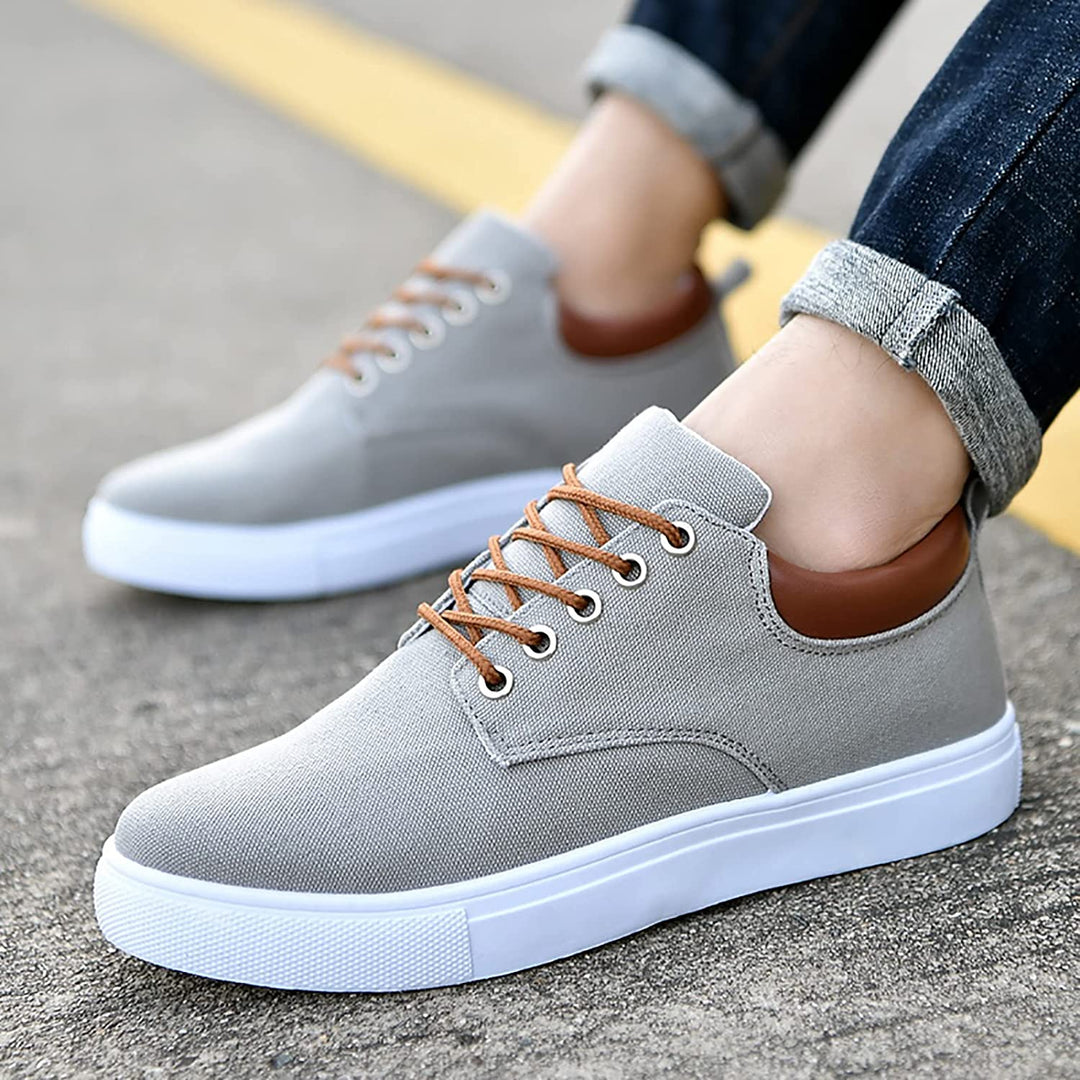 Close-up van de ondersteunende witte zool van de David herensneakers, voor optimaal comfort.
