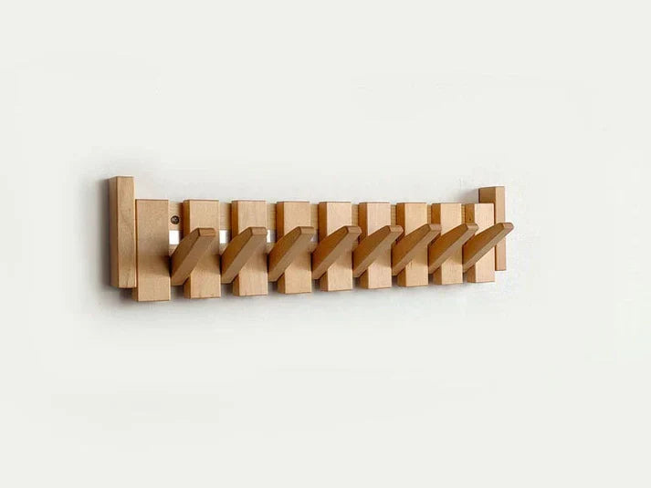 Stijlvolle hal opberger: piano kapstok wandrek. Muziek thema interieur design, modern en praktisch.