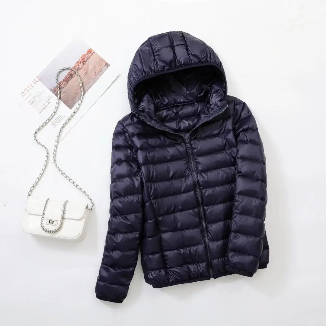 Hoymans dames donsjas met capuchon, lichtgewicht en warm voor de winter.