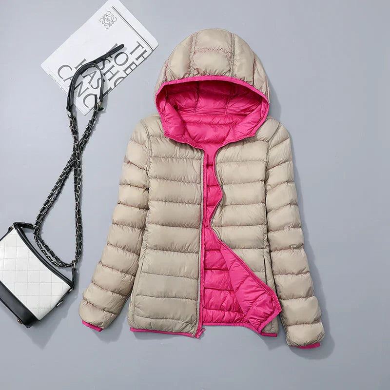 Warme en comfortabele dames donsjas met capuchon, ideaal voor de winter.