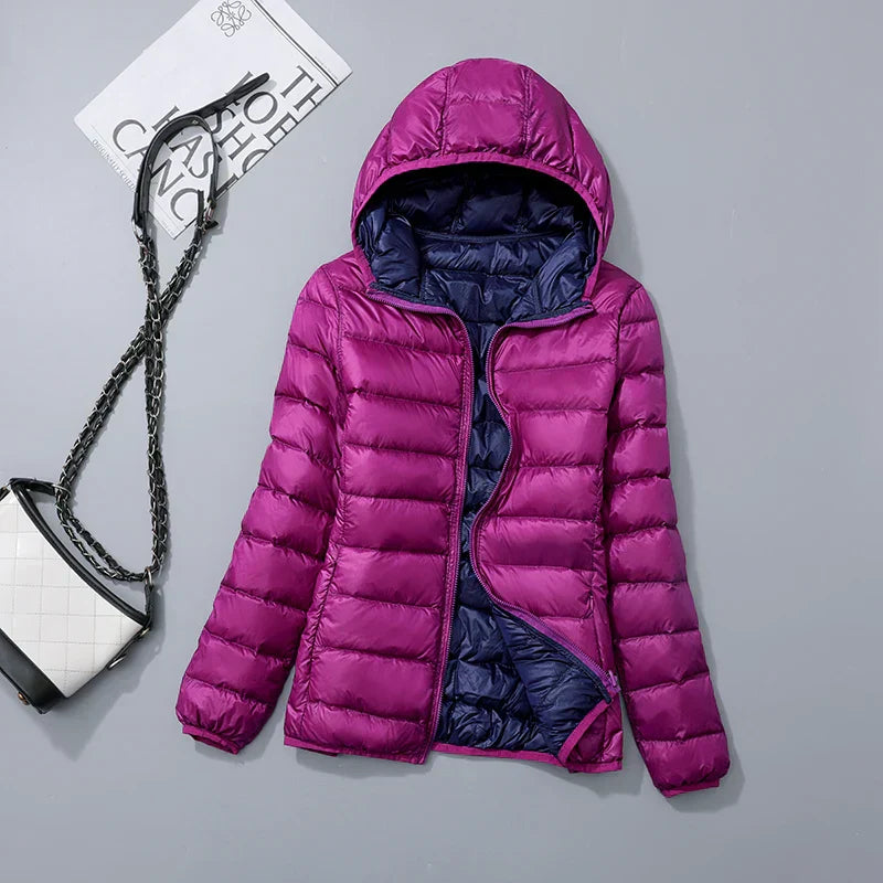 Dames winterjas van Hoymans, lichtgewicht eendendons met capuchon.