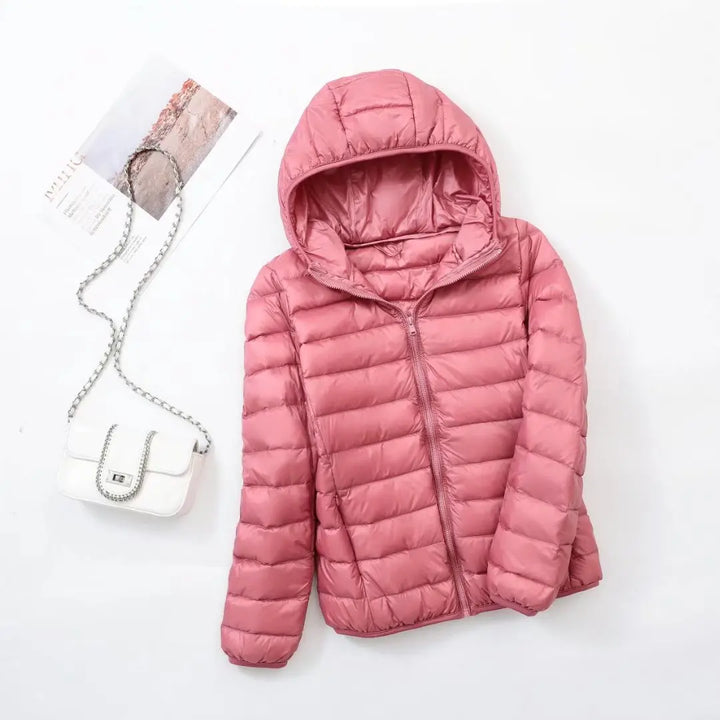 Dames donsjas, lichtgewicht en warm, van Hoymans, met comfortabele capuchon.