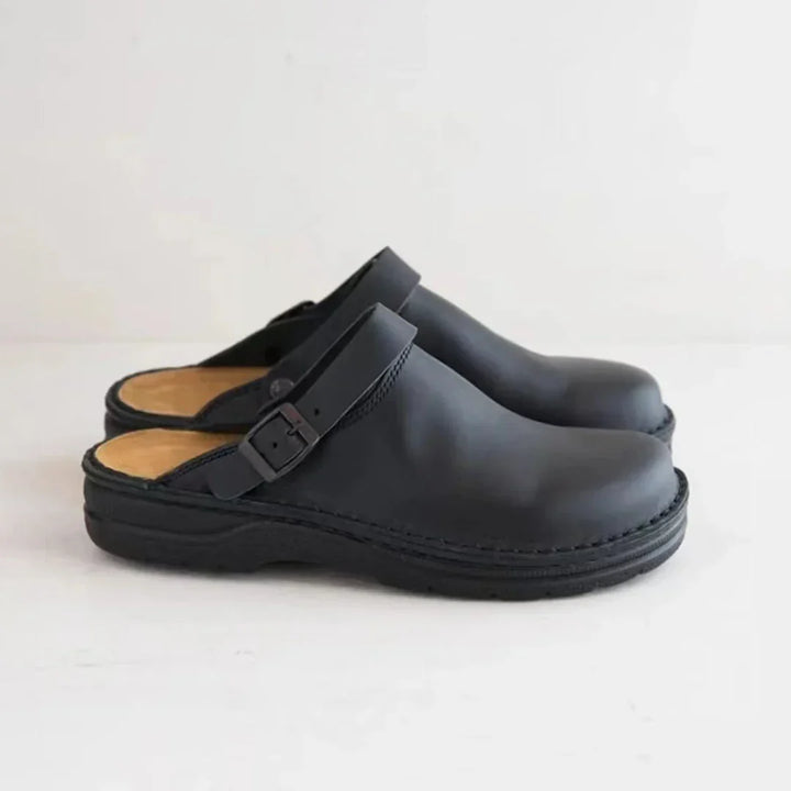 Zwarte Hoymans casual herenpantoffels, stijlvol en comfortabel voor ontspanning thuis.