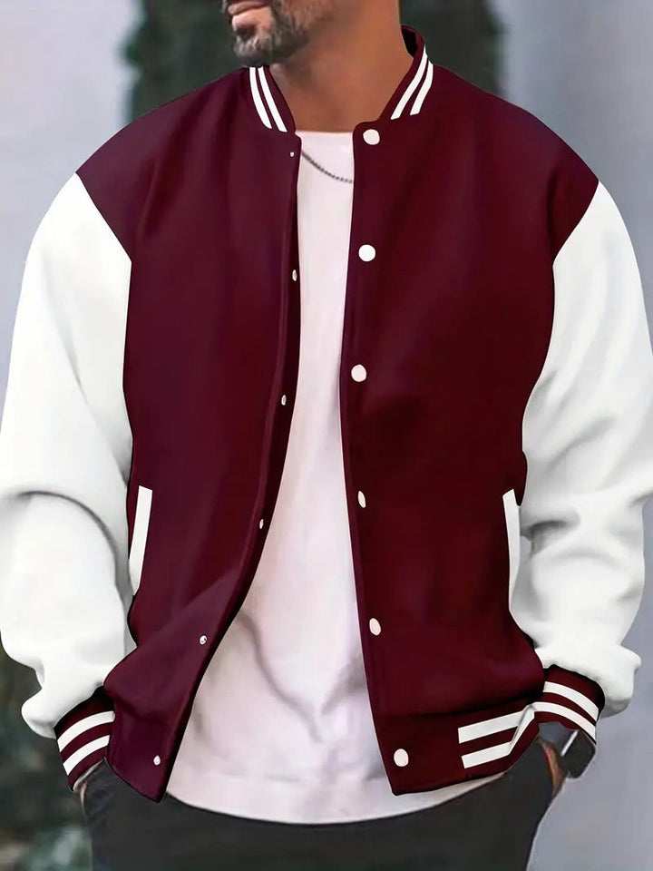 Close-up Hoymans heren baseballjack toont polyester stof en sportieve afwerking. Ideaal voor heren outfits.