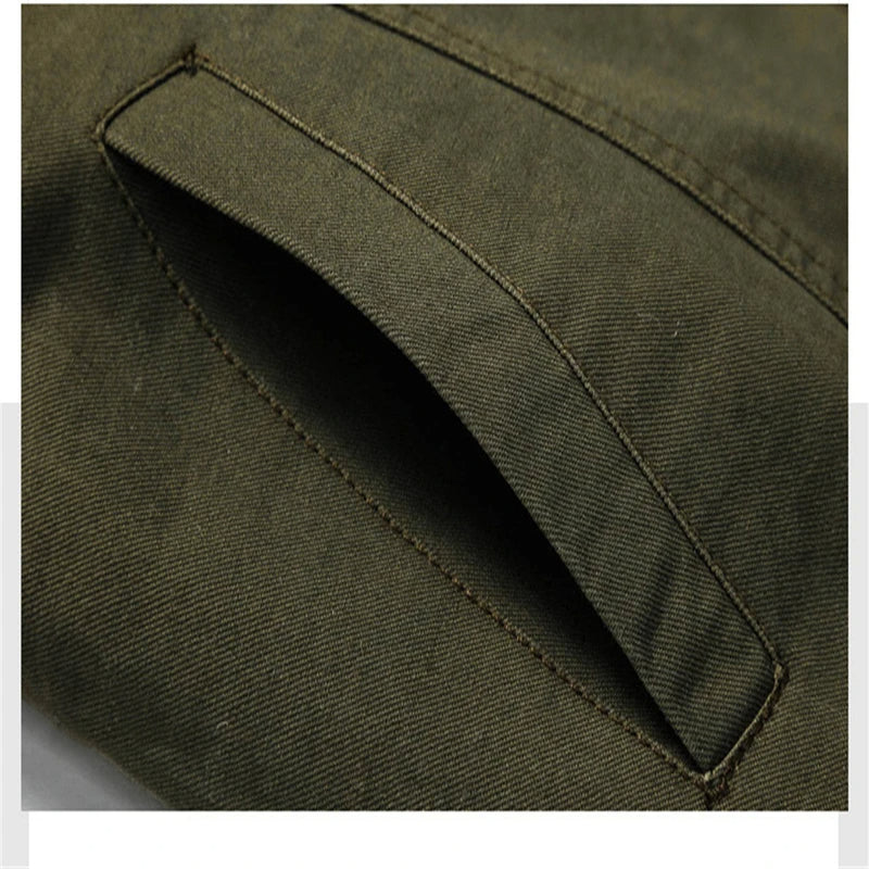Veelzijdige Hoymans heren militaire jas in khaki, geschikte seizoensjas. Stijlvol katoen/polyester jack.