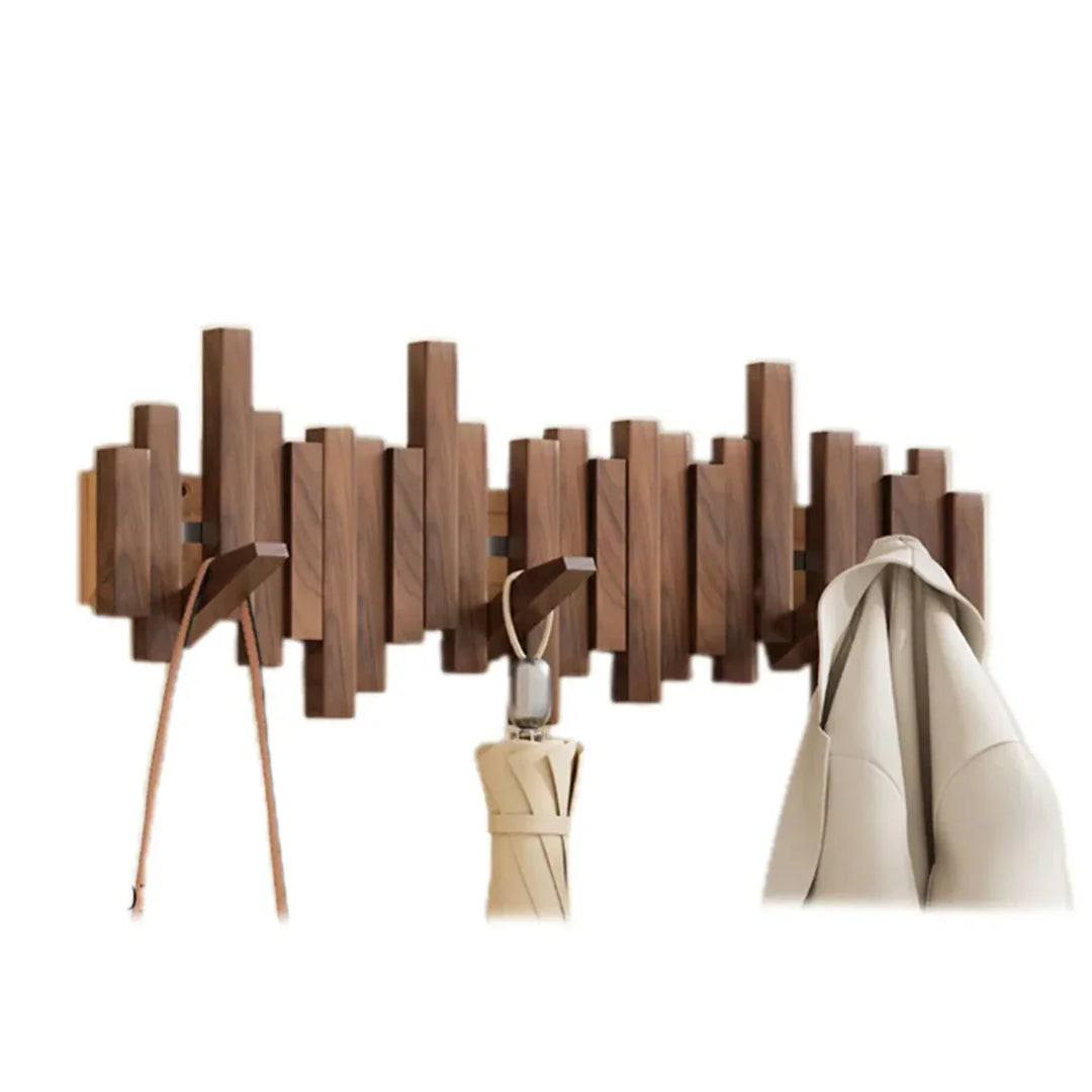 Stijlvolle houten wandkapstok Piano in walnoot met jassen en accessoires