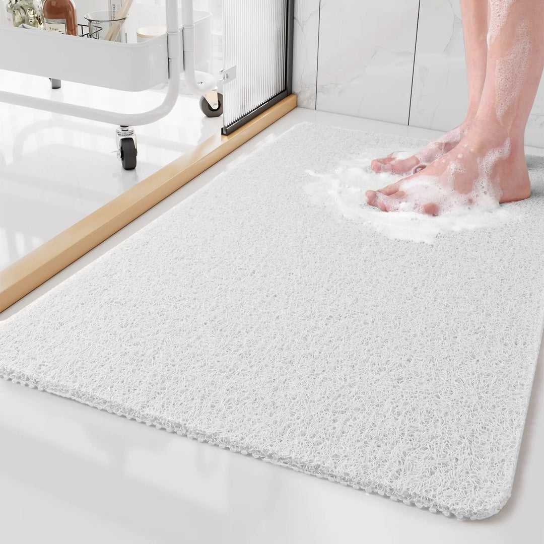 Gedetailleerde weergave van de onderzijde van de douchemat met anti-slip noppen
