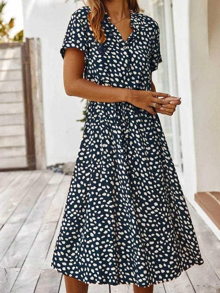 Stijlvolle dames midi jurk met all-over print en knoopsluiting