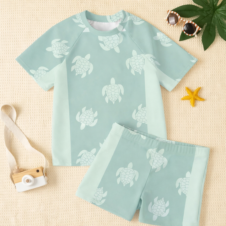 Casual jongens zwemset: comfortabel sneldrogend zwemshirt en bijpassende zwemshorts in blauw/meerkleurig.