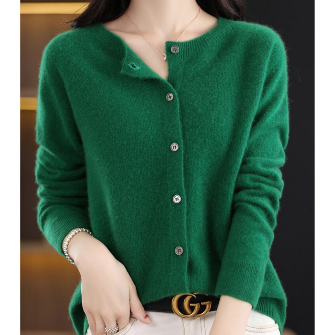 Donkerblauwe damestrui met klassieke knopen, elegant en warm voor damesmode.