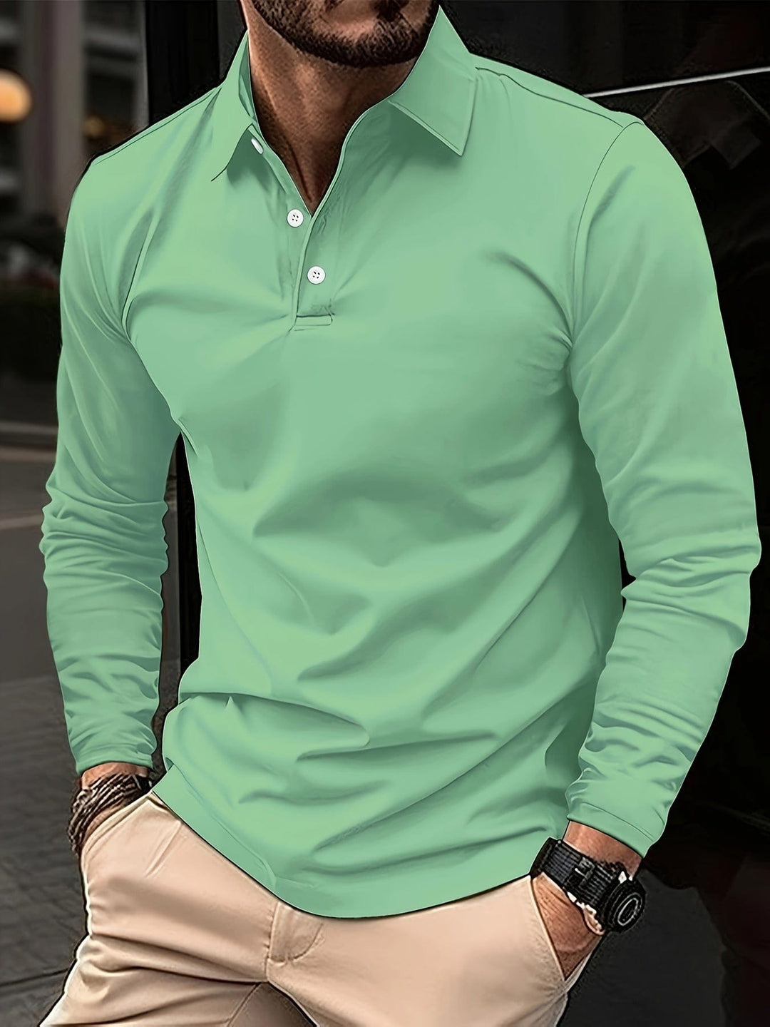 Klassieke herenpolo met lange mouwen, ideaal voor een elegante, casual look in lente of herfst.