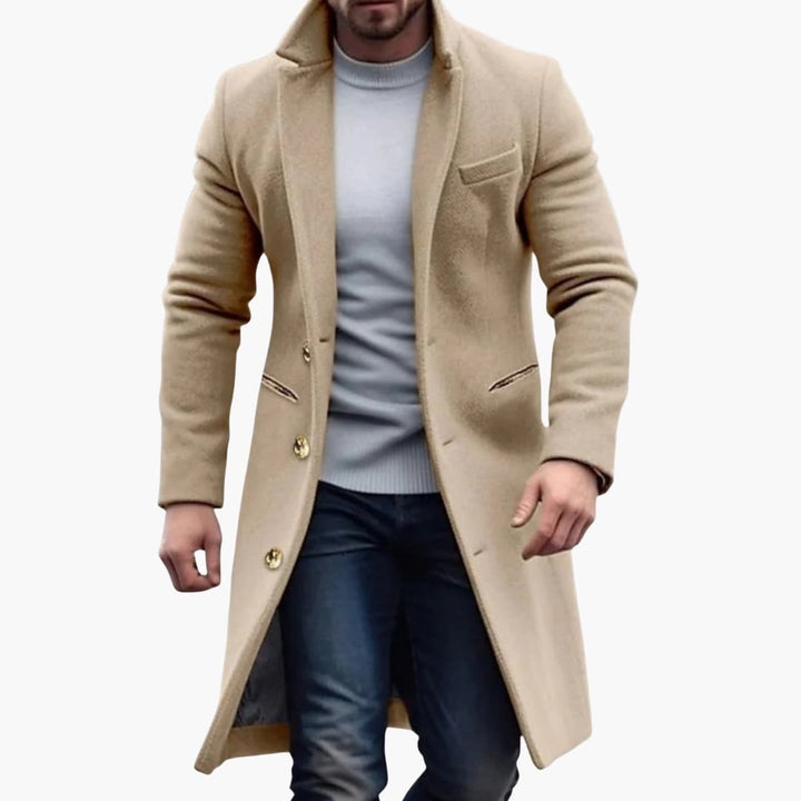 Elegante herenjas, lange uitvoering met knopen, ideaal als stijlvolle buitenkleding voor casual of zakelijke look.