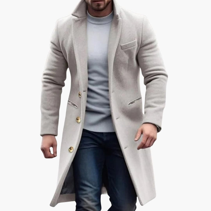 Stijlvolle klassieke lange herenjas met knoopsluiting en reverskraag, perfecte elegante buitenkleding voor mannen.