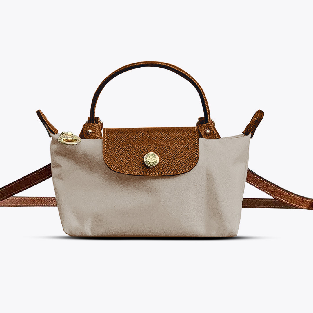 Beige mini schoudertas voor dames met elegante sluiting