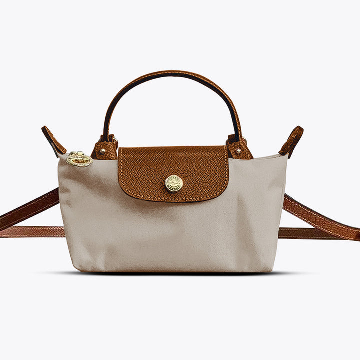 Beige mini schoudertas voor dames met elegante sluiting
