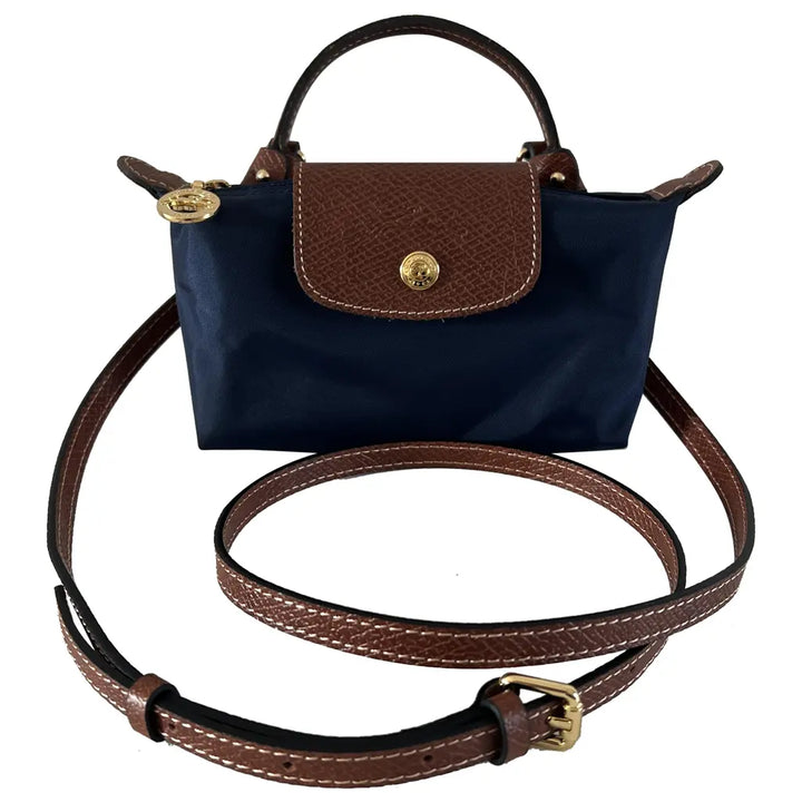 Overzicht van de verschillende kleurvarianten van de mini tas