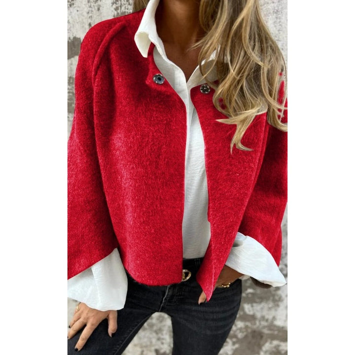 Veelzijdige korte dames tussenjas met knopen. Combineert elegantie en comfort voor lente en herfst.